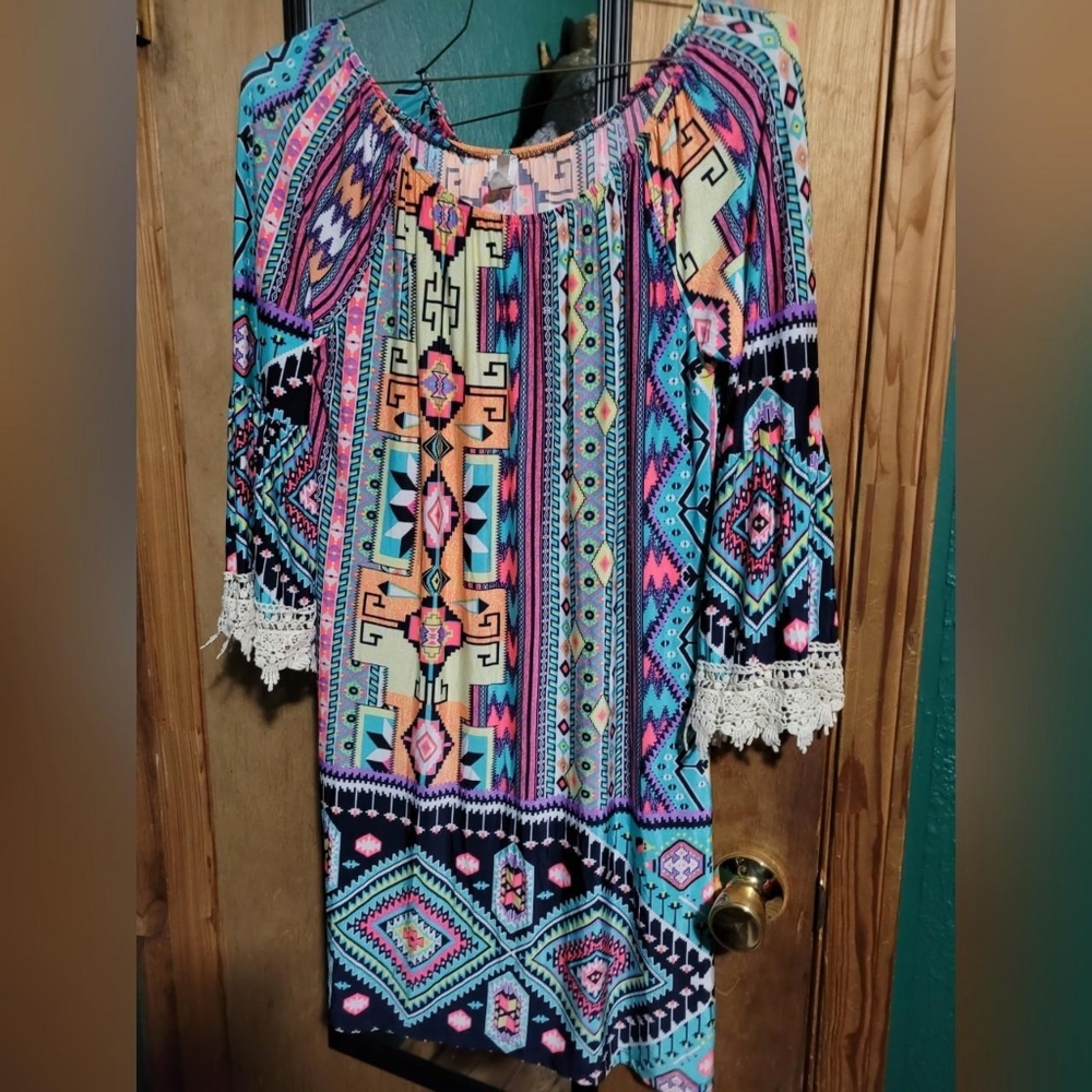 Off the shoulder boho dress with lace detailing on the end of the sleeves